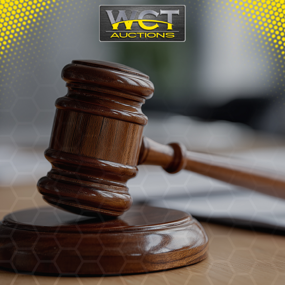 Auction gavel on wooden block representing liquidation and asset sale processes – WCT Auctions