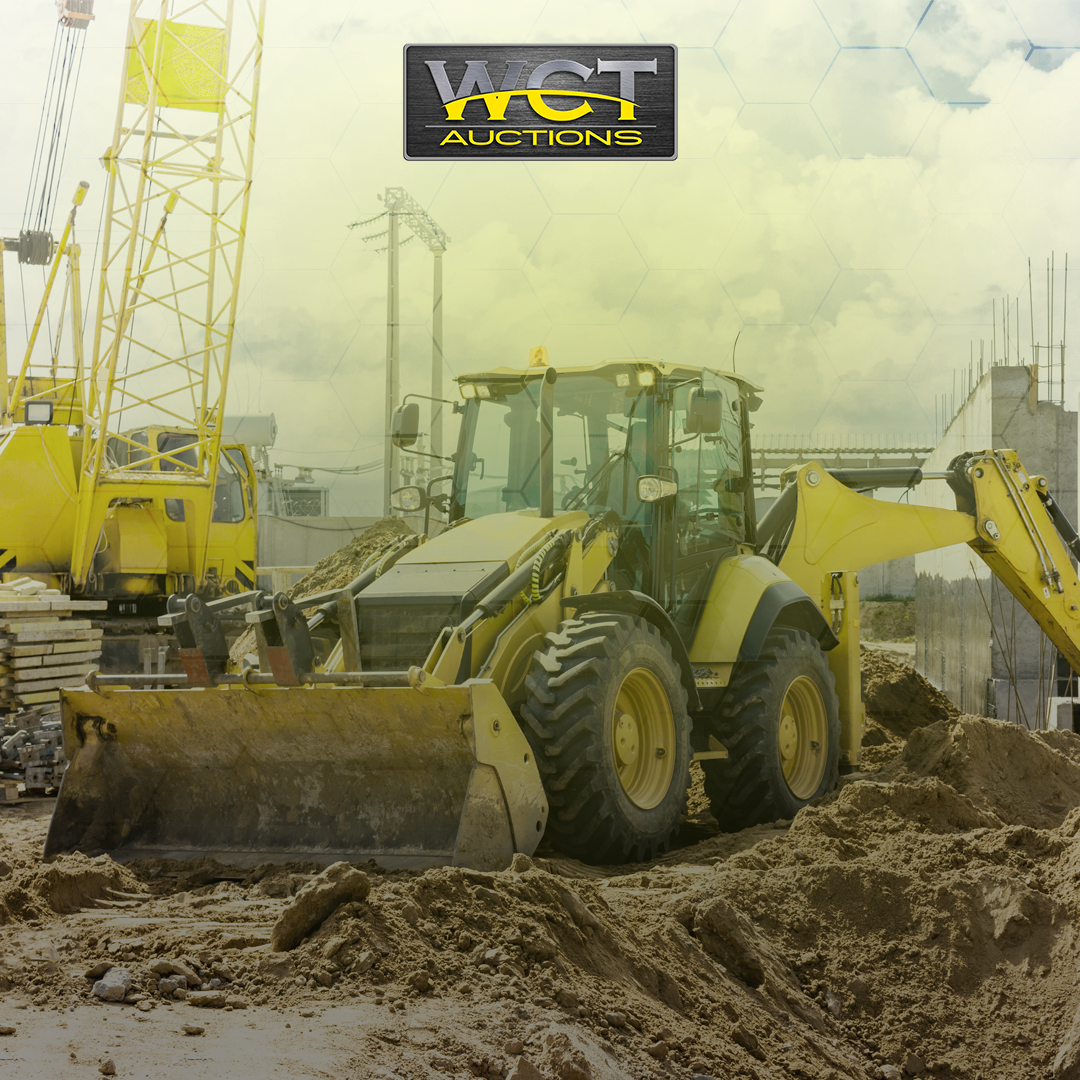 WCT Auctions plant hire equipment and yellow metal machinery on construction site
