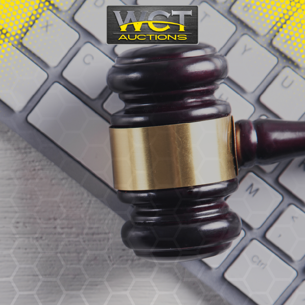 Auction gavel on computer keyboard symbolising timed online auctions by WCT Auctions